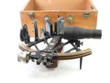 a small wooden box with a sexop on top of it
