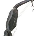 une sculpture représentant un homme tenant un bâton à la main