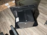 a laptop computer that is sitting on top of a box