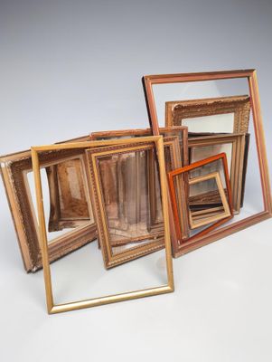 four different frames that are stacked together on a white surface