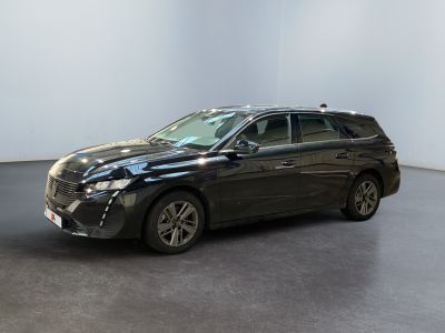 the black toyota sienna is parked in a white room
