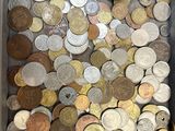 a lot of coins in a box on the table