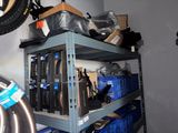 a shelf with many items on it in a room