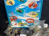 a pile of legos sitting on a table next to a sign