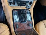 a car dashboard with a clock and radio in it