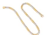 a gold and silver chain bracelet on a white background