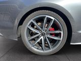a close up view of a car ' s wheel and tire