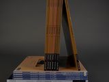 books stacked on top of each other on a gray surface