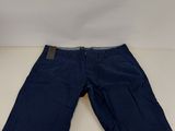 a pair of blue shorts sitting on top of a white table