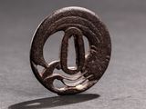 a small metal object that is sitting on a table