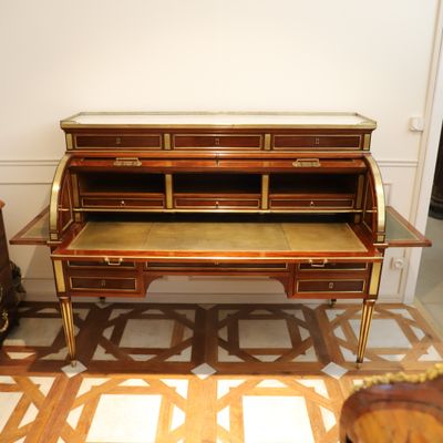 an image of a desk and chair in a room