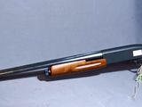 the rifle is laying on the table ready to be used