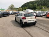 a lot of cars that are parked in a parking lot