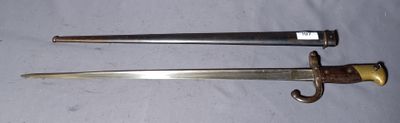 two knives are laying on a white surface next to each other