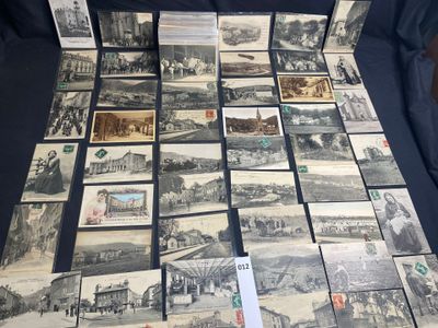 a lot of old postcards that are on the table