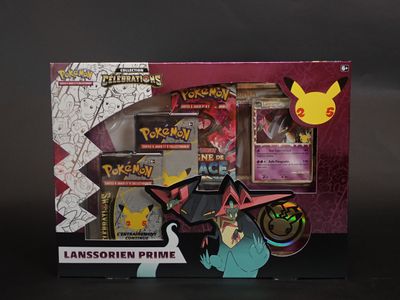 La boîte comporte l'image d'une figurine de Pokémon.