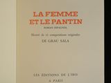 an open book with a picture of a woman on it
