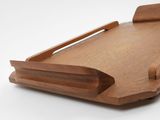 an image of a wooden tray with a handle on a white surface