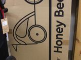 a bike that is sitting in front of a box