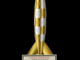 gold and silver rocket award on black background with certificate