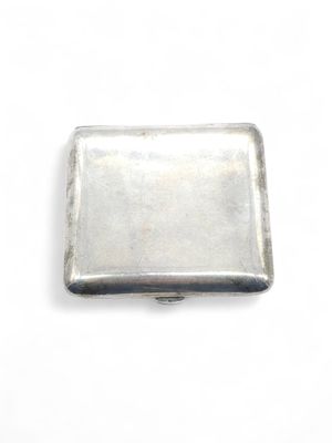 rectangular silver plated metal business card holder on a white background