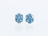 une paire de boucles d'oreilles en topaze bleue et diamants