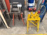 a machine that is sitting on the ground next to other machines