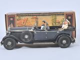 a toy car with two men in it and a box on the side