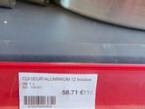 a close up of a metal pan on a shelf