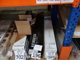 many boxes and packages on the shelves of a store