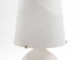 an image of a white table lamp with a white shade on it