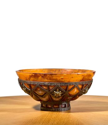 a bowl that is sitting on a wooden table