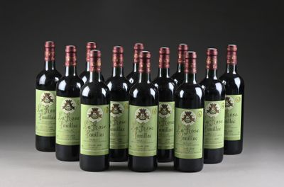 six bouteilles de vin rouge sont alignées