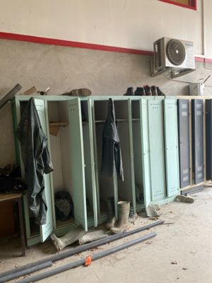 several lockers are lined up in a row in a room
