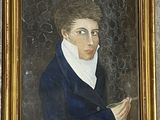 portrait d'un jeune homme vêtu d'un manteau bleu, tenant une cigarette