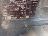 a close up of a car door with a sticker on it