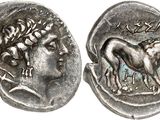 a silver coin with an image of a lion on it