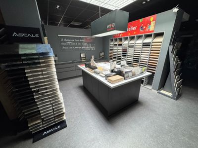 a large display of tile in a store with a lot of shelves