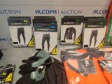 several pairs of gloves, gloves, gloves, gloves, and other items on a table