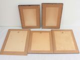 three wooden picture frames sitting on top of a white surface