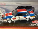 a model of a rally car in a display case