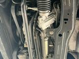 a close up view of a car ' s front suspension