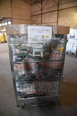 a cart with a lot of items in it in a warehouse