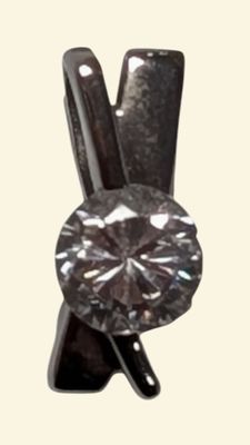 Pendentif en or blanc 18K (750/°°) centré d'une pierre blanc…