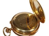 an image of a gold pocket watch on a white background