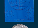 a small blue plaque with a picture of a globe on it