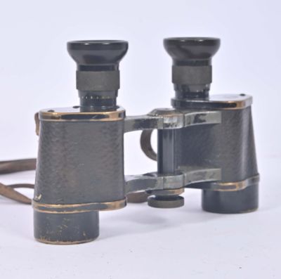 a pair of binoculars that are sitting on a table