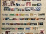 a picture of a wall hanging with stamps on it
