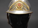 an image of a helmet on a mannequin head with a red star on it
