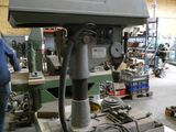 a machine that is sitting on a table in a workshop